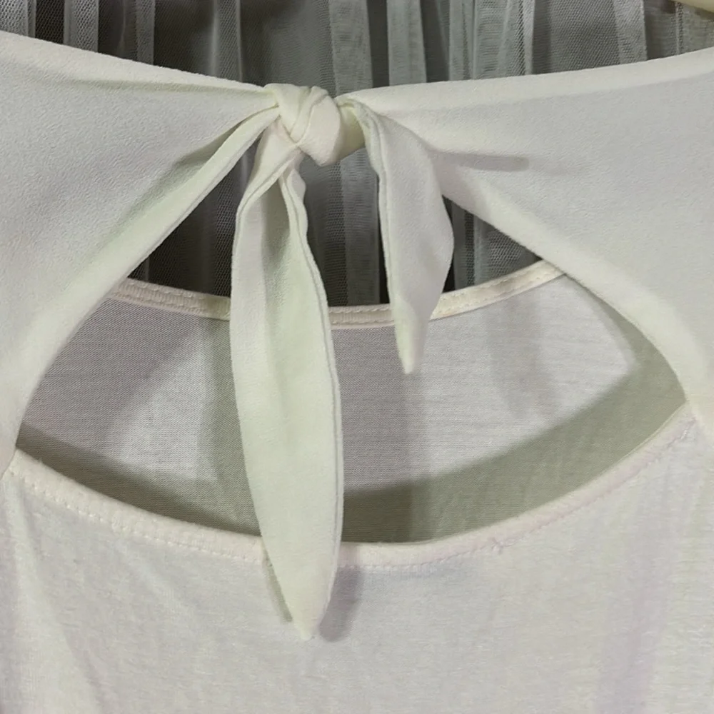 Stretchy cream sheer sleeves blouse! Tie back with key hole!